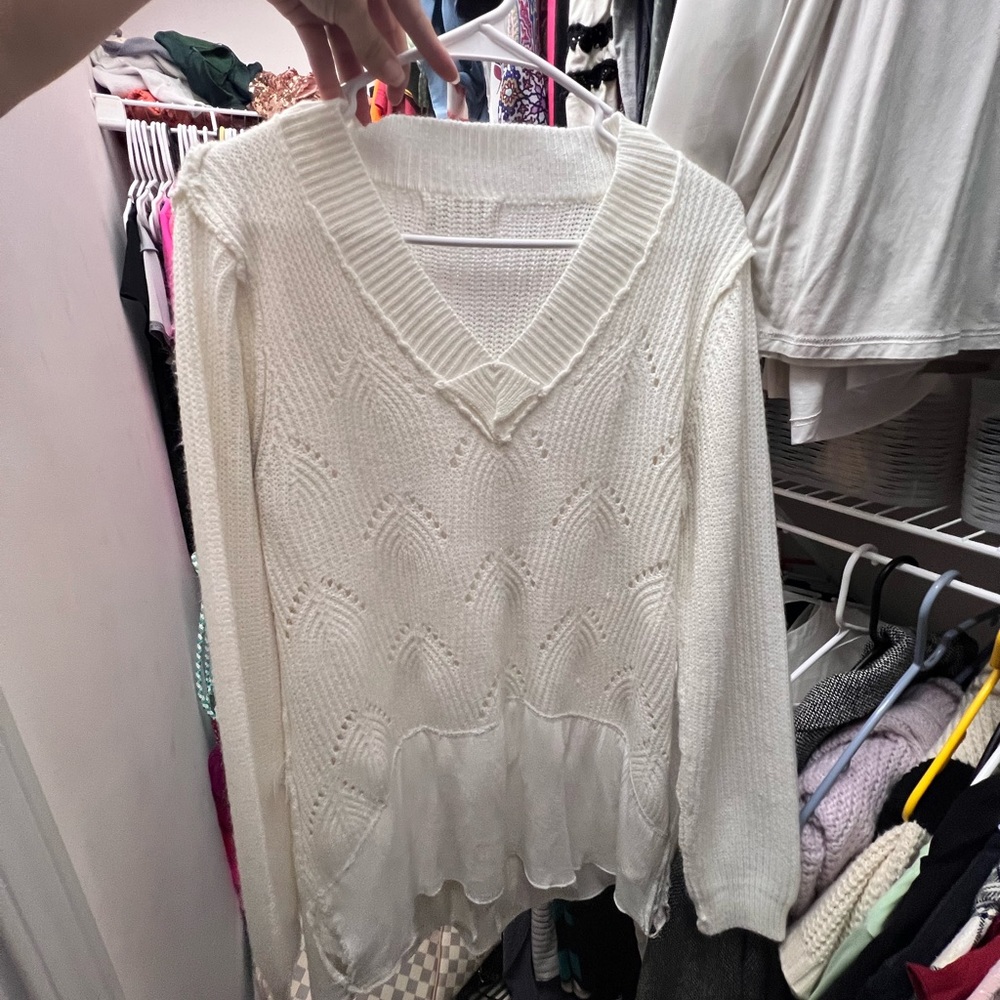 White sweater with distressed hem
